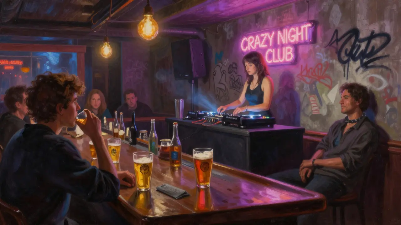 Bar at Crazy Night Club Caen with neon signs, patrons drinking cider, DJ mixing music amid graffiti-covered walls.